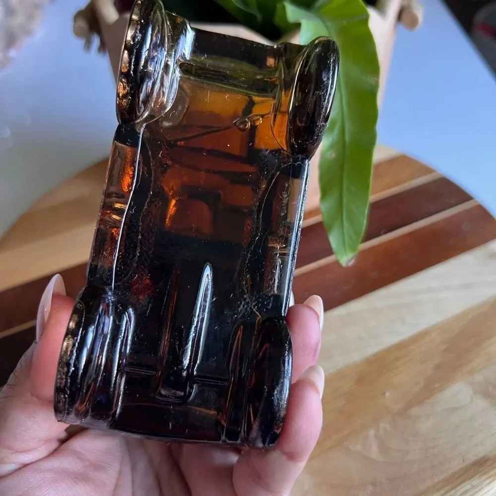 vintage Avon 1906 Reo Depot Wagon bottle.ambar color glass full